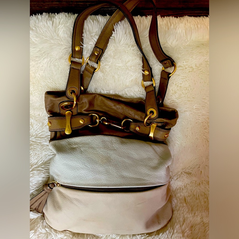 B. Makowsky tri-colored leather shoulder bag.